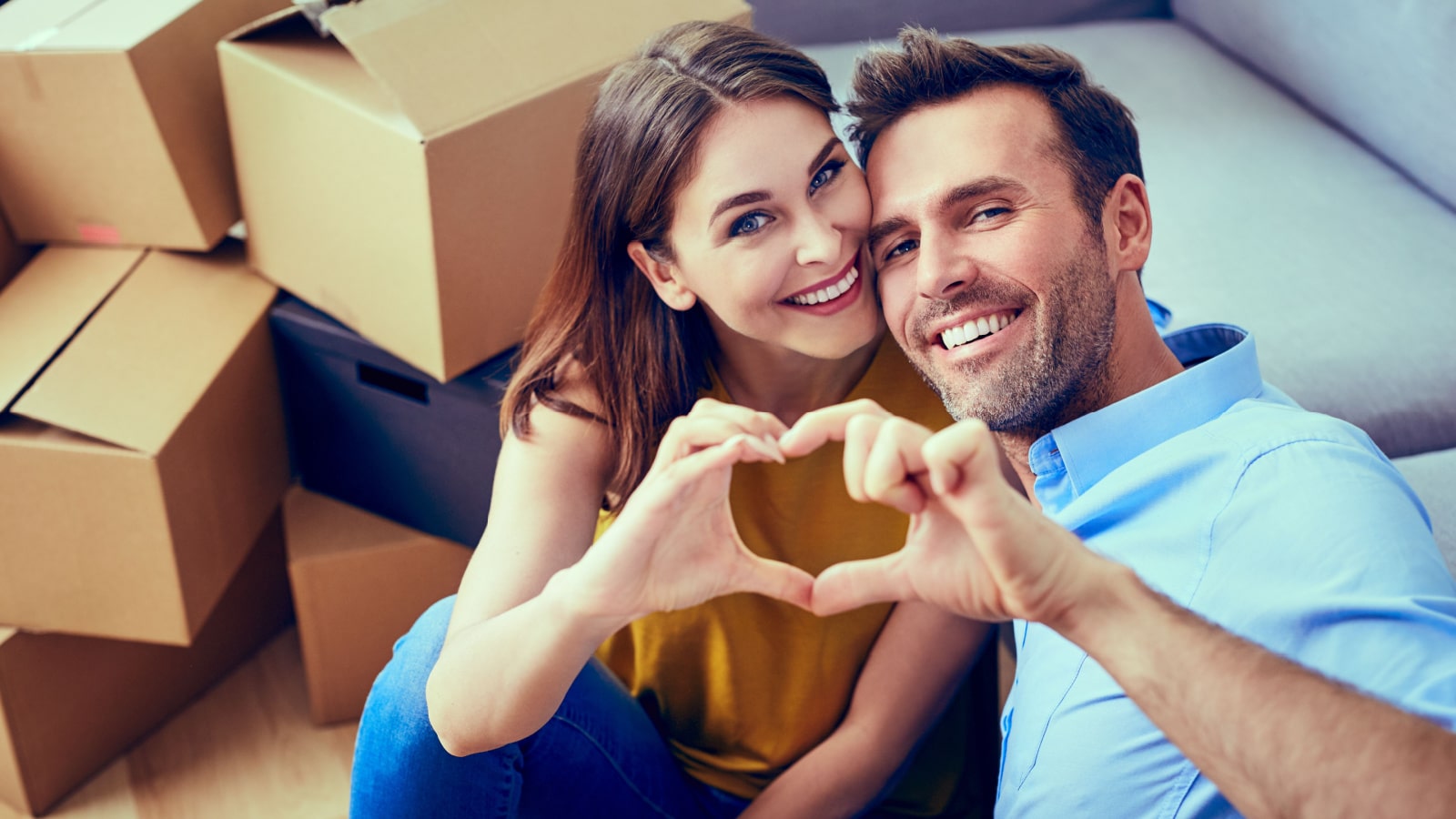 happy couple moving